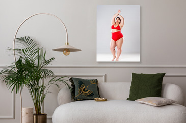 Plus size model in lingerie, fat woman on gray background