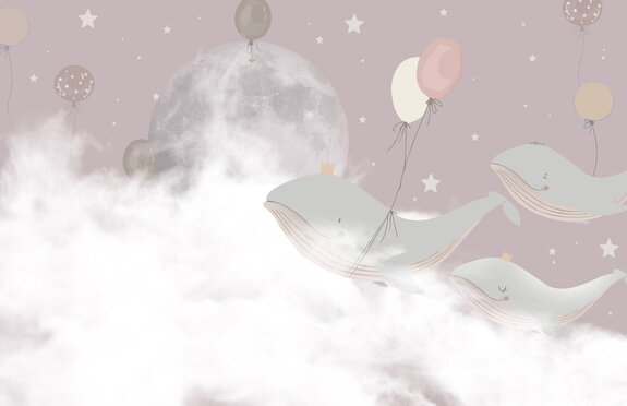 Wale mit luftballons vor einem rosa himmel