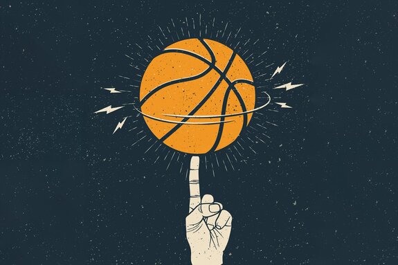 Basketball, der sich auf einem finger dreht