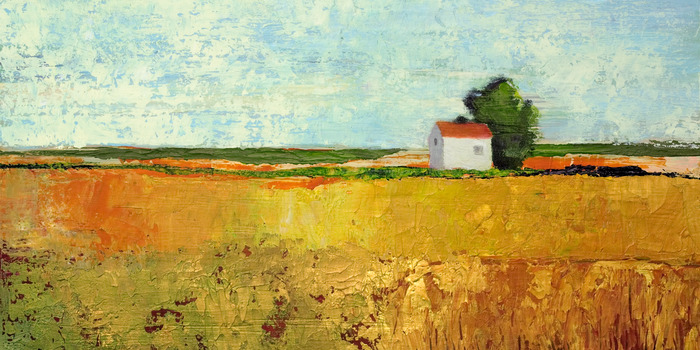 Ein weißes haus neben einem feld mit reifendem getreide