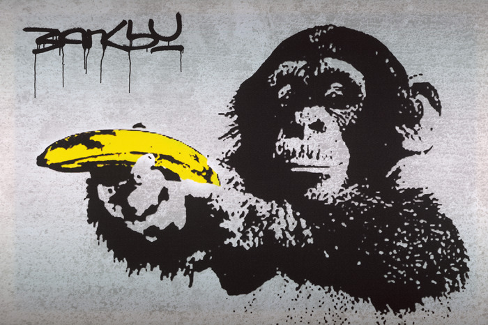 Banksy-reproduktion: affe mit banane