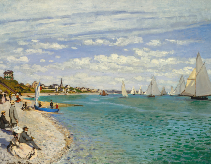 Ein belebter strand mit segelbooten am horizont