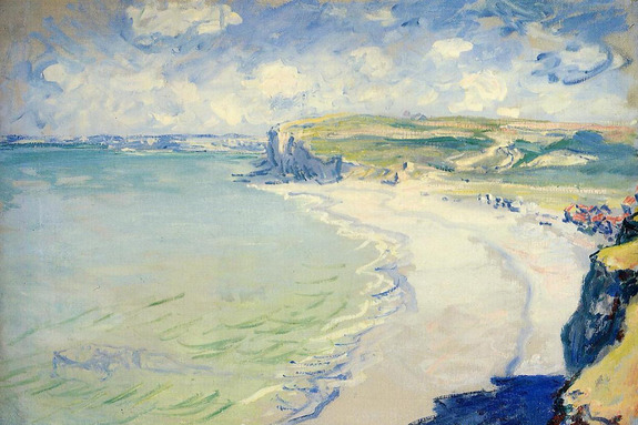 Eine bezaubernde landschaft an der meeresküste mit einem sandstrand