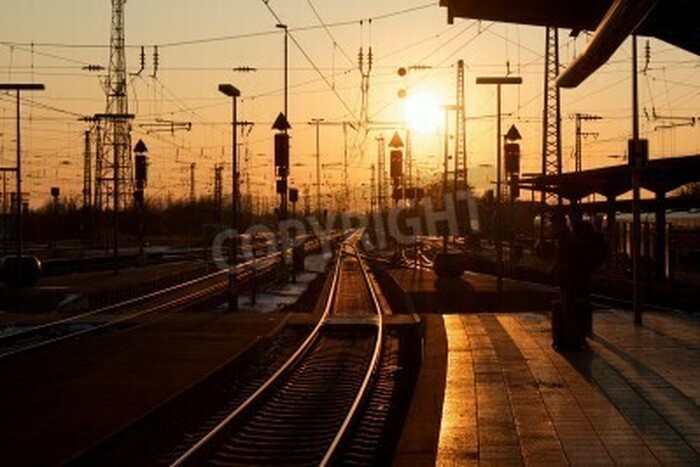 Bild Sonnenaufgang am Bahnhof