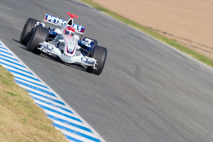 Fototapete Rasender Bolid auf der Rennstrecke Formel 1