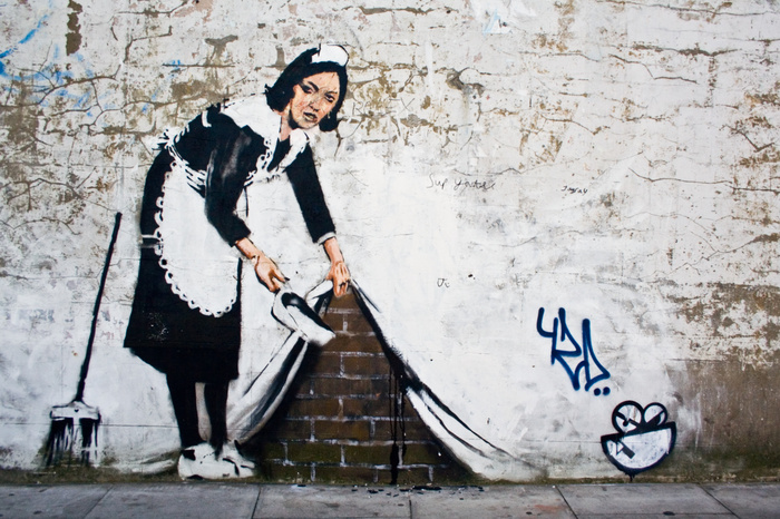 Briques de mur graffitis de banksy
