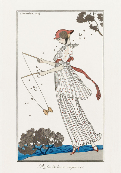 Jeune femme en costume à pois