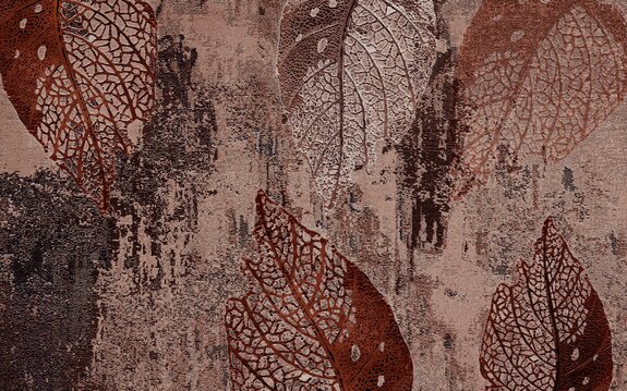 Feuilles sur un fond de béton texturé