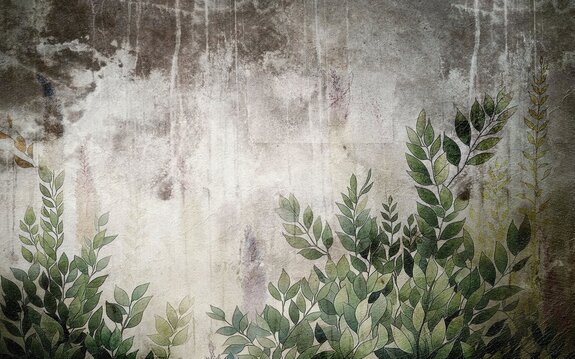 Feuilles vertes sur béton gris