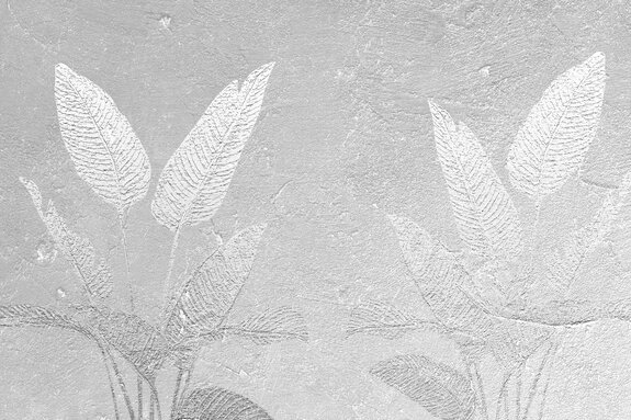 Imitation de feuilles sur béton gris