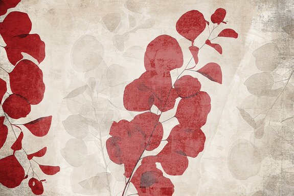 Feuilles rouges et beiges sur béton