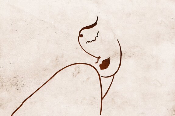 Dessin d'un visage féminin sur le béton