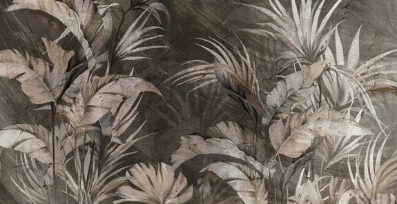 Feuilles tropicales sur fond en béton de style industriel