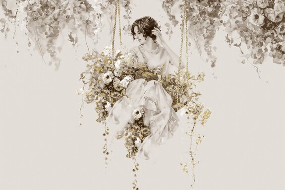 Femme sur une balançoire parmi les fleurs