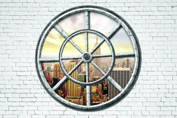 Vue à travers une fenêtre ronde sur new york