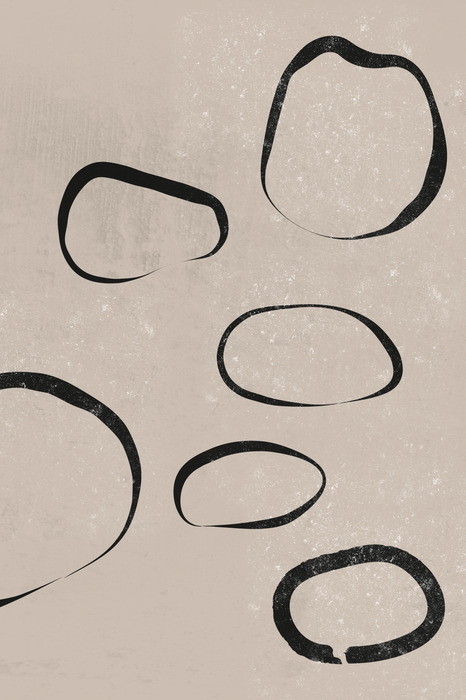 Des cercles noirs minimalistes sur fond beige