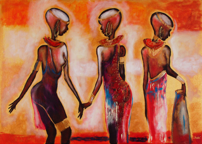 Des filles en costumes africains ornés