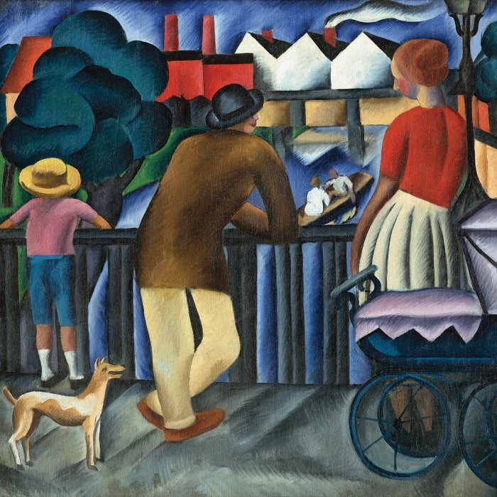 Une famille sur un pont au-dessus d'une rivière