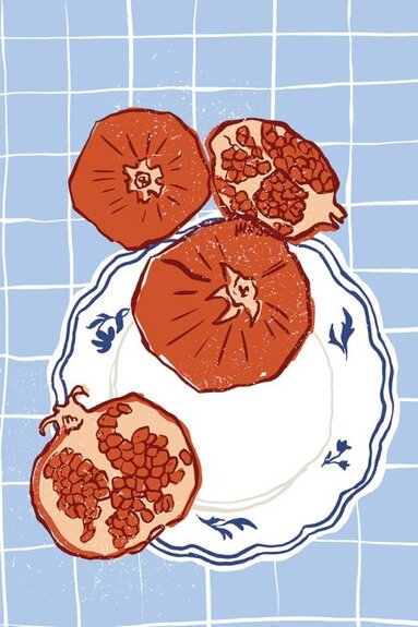 Assiette décorative avec des grenades mûres