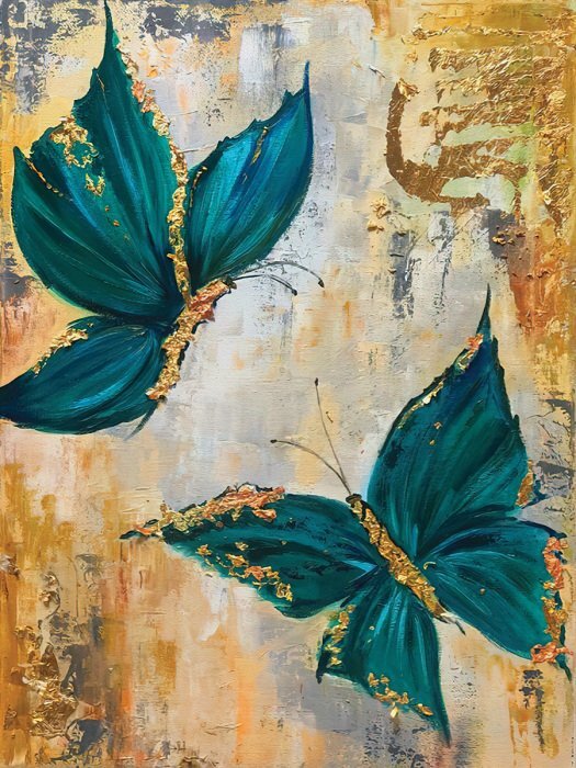 Papillons turquoise avec des détails dorés brillants