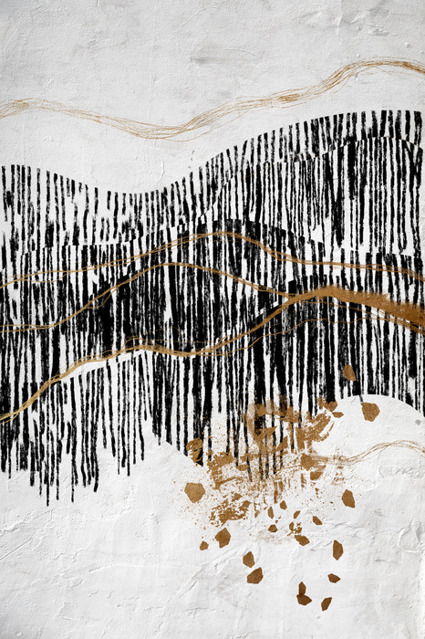 Une composition avec des lignes et des décorations dorées