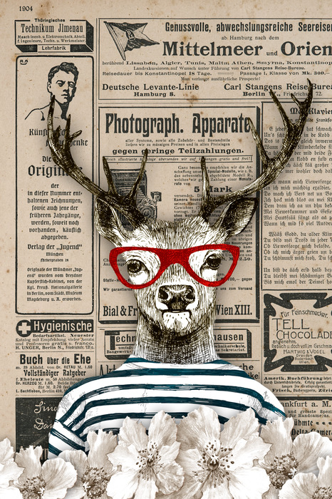 Portrait d'un cerf portant des lunettes sur fond de journal