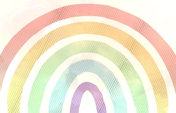 Pastel regenboog met stippen op een lichte achtergrond