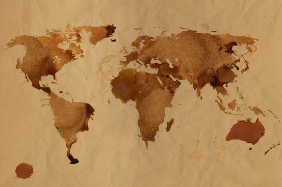 Vintage wereldkaart met koffievlekken
