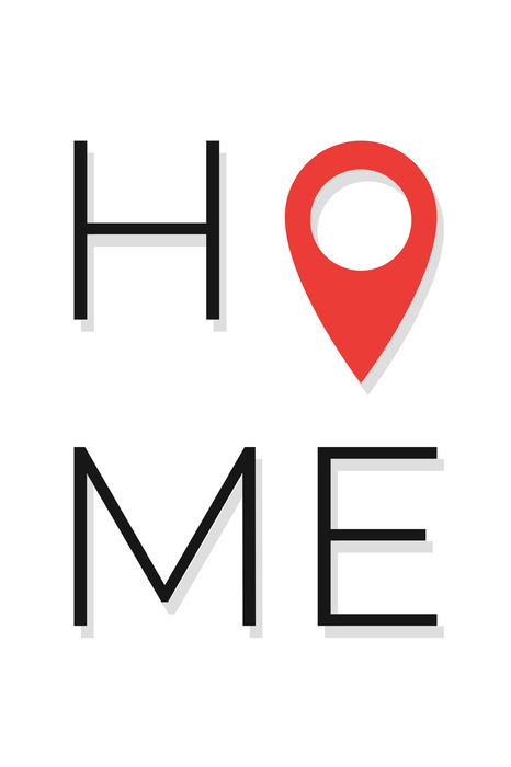 Zwarte home-letters en een rode speld