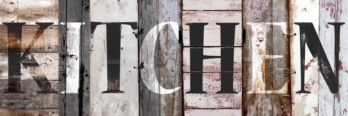 Het opschrift "keuken" op de planken