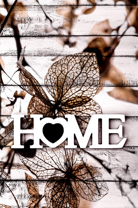 Typografie over een huis met een natuurthema