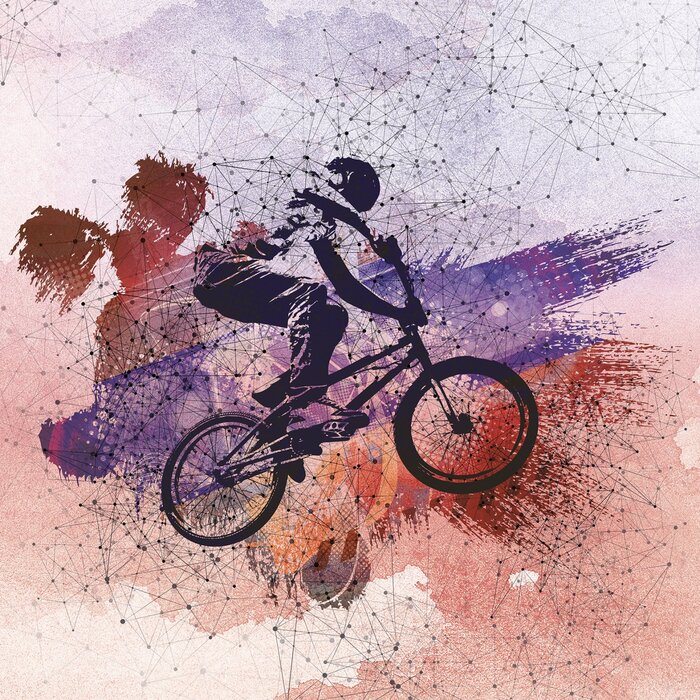 Dynamische fietssprong tegen een abstracte achtergrond