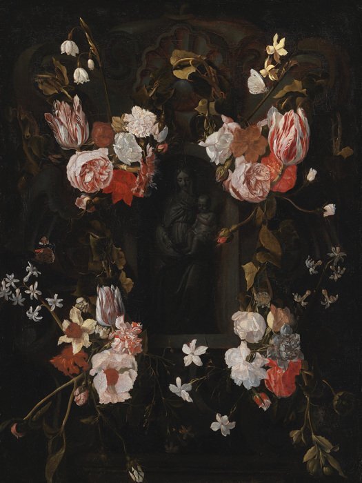 Een moeder en kind gewikkeld in een bloemenkrans