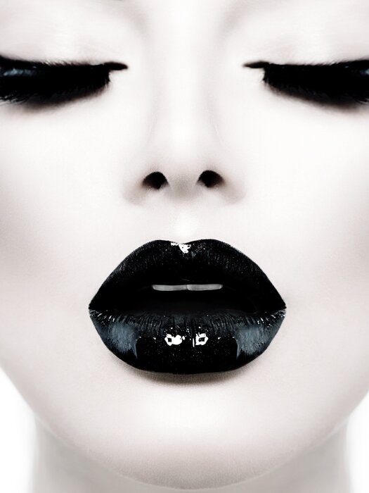 Glamour portrait of a woman with black lips