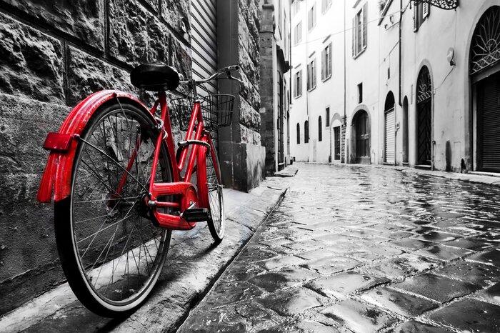 Red bicycle and black-and-white architecture