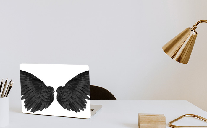 Sticker Schwarze Flügel auf weißem Hintergrund nach Maß 