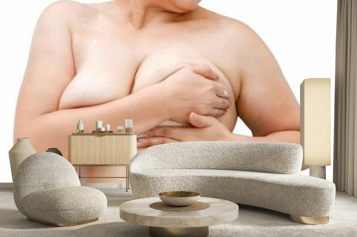 A Woman With Overweight And Saggy Breasts Smears Cream On The Chest Stock  Photo, Picture and Royalty Free Image. Image 125454102.